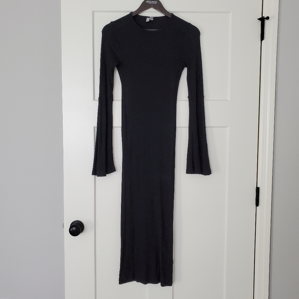 Black bodycon dress with flutter sleeves